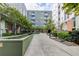 Exterior courtyard view with landscaping, water feature and multiple entry doors at 620 Glen Iris Ne Dr # 410, Atlanta, GA 30308