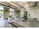 Well-equipped gym featuring modern cardio machines, weight equipment, and ample natural light at 620 Glen Iris Ne Dr # 410, Atlanta, GA 30308