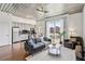 Bright living room featuring modern furnishings and a walk-out balcony with city views at 620 Glen Iris Ne Dr # 410, Atlanta, GA 30308