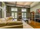 Bright lounge area featuring comfortable seating, large windows, and stylish decor at 620 Glen Iris Ne Dr # 410, Atlanta, GA 30308
