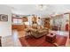 Cozy open-concept living space with a kitchen, living room, and breakfast nook at 7420 Colony Ct, Cumming, GA 30041