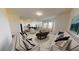 Spacious living room with neutral decor, plush seating, and an open floor plan perfect for entertaining at 7770 Sudbury Cir, Covington, GA 30014