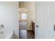 Bathroom leading to the bedroom with a vanity area and tiled floors at 811 Betsy Ross Trl, Hampton, GA 30228