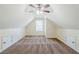 Finished bonus room with carpeting, dormer windows, and side storage at 811 Betsy Ross Trl, Hampton, GA 30228