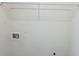 Simple closet with wire shelving and washer-dryer hookups at 811 Betsy Ross Trl, Hampton, GA 30228
