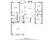 Detailed floor plan showcasing layout with primary bedroom, kitchen, living room, and garage dimensions at 811 Betsy Ross Trl, Hampton, GA 30228