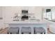 Modern kitchen boasts granite countertops, an island with seating, and stainless appliances for both style and function at 1573 Aiden Way # 37, Conyers, GA 30013