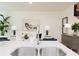 Kitchen sink overlooking the living area in an open floor plan at 1573 Aiden Way # 37, Conyers, GA 30013