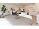 Open concept living space showcasing the kitchen, dining area, and living room at 1573 Aiden Way # 37, Conyers, GA 30013