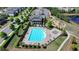 Community pool with lounge chairs, pool house, and playground nearby at 4030 Spencer Green, Cumming, GA 30040