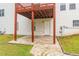This home features a covered back patio with a white door at 1241 Hogan Ridge Ct, Grayson, GA 30017