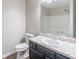Bathroom featuring a sink, toilet, and shower/tub combo at 1241 Hogan Ridge Ct, Grayson, GA 30017