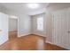 Bedroom featuring tile flooring, neutral walls and plenty of natural light at 1241 Hogan Ridge Ct, Grayson, GA 30017