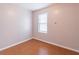 Compact bedroom with tile floors, light walls and a window at 1241 Hogan Ridge Ct, Grayson, GA 30017