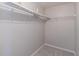 Walk-in closet with wire shelving providing ample storage space for an organized wardrobe at 1241 Hogan Ridge Ct, Grayson, GA 30017