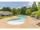 Community pool with lounge chairs and clear blue water, perfect for relaxation and recreation at 1241 Hogan Ridge Ct, Grayson, GA 30017