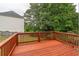 A charming stained wooden deck offering an enjoyable outdoor space at 1241 Hogan Ridge Ct, Grayson, GA 30017