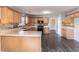 Spacious kitchen with stone counters and stainless steel appliances at 1241 Hogan Ridge Ct, Grayson, GA 30017