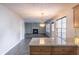 Open concept kitchen and living room area with breakfast bar at 1241 Hogan Ridge Ct, Grayson, GA 30017