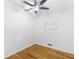 Cozy bedroom with hardwood floors, white trim, and a ceiling fan to keep the room cool and comfortable at 2037 Lenox Ne Rd, Atlanta, GA 30324