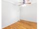 Bright bedroom featuring hardwood floors, a ceiling fan, and a closet for ample storage space at 2037 Lenox Ne Rd, Atlanta, GA 30324