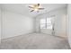 Bedroom featuring a ceiling fan, carpeted floors, natural light and neutral colored walls at 2526 Knob Creek Dr, Snellville, GA 30078