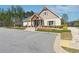 Clubhouse exterior with well-maintained landscaping, enhancing community appeal at 2526 Knob Creek Dr, Snellville, GA 30078