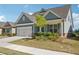 Charming two-story home with a two-car garage and manicured front yard at 2526 Knob Creek Dr, Snellville, GA 30078