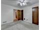 Bedroom featuring neutral carpet and multiple wood doors at 2963 Williams Pl, Snellville, GA 30078