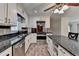 Beautiful kitchen featuring sleek countertops, stainless appliances, and ample storage at 2963 Williams Pl, Snellville, GA 30078