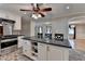 Kitchen island with bar seating offers extra space for food preparation and storage at 2963 Williams Pl, Snellville, GA 30078