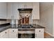 Modern kitchen featuring an island cooktop, stainless steel appliances, and great storage at 2963 Williams Pl, Snellville, GA 30078