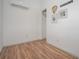 Bedroom featuring hardwood floors, white walls, and natural light at 3078 Semmes St, East Point, GA 30344