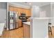 Kitchen featuring stainless steel appliances, light wood cabinets, and eat in bar at 3499 Henderson Reserve, Atlanta, GA 30341