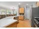 Well-lit kitchen with stainless steel appliances and a breakfast bar at 3499 Henderson Reserve, Atlanta, GA 30341