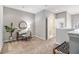 Upstairs loft area with desk, chair, bench and neutral carpet at 3499 Henderson Reserve, Atlanta, GA 30341