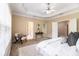 Spacious main bedroom with ceiling fan, area rug and large windows for natural light at 3499 Henderson Reserve, Atlanta, GA 30341
