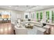 Spacious living room offers hardwood floors and doors leading to the outdoor patio at 385 Laurel Chase Ct, Atlanta, GA 30327