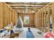 Unfinished basement with exposed beams and insulation, providing a blank canvas for customization at 3950 Grandview Manor Dr, Cumming, GA 30028