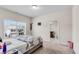 Bedroom featuring a large window and a view into the ensuite bathroom at 3950 Grandview Manor Dr, Cumming, GA 30028