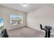 Cozy bedroom featuring large windows and neutral walls, offering a relaxing atmosphere at 3950 Grandview Manor Dr, Cumming, GA 30028