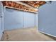 Finished basement with light blue walls and concrete floor at 3899 Leach Rd, Snellville, GA 30039