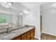 Bathroom featuring a double sink vanity with stone counters at 3899 Leach Rd, Snellville, GA 30039