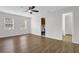 Spacious bedroom with ceiling fan, laminate floors and an adjoining closet at 3899 Leach Rd, Snellville, GA 30039
