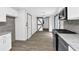 Updated kitchen with modern appliances and barn door at 3899 Leach Rd, Snellville, GA 30039