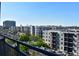 Exterior shot of residential buildings with a cityscape in the background at 711 Cosmopolitan Ne Dr # 715, Atlanta, GA 30324
