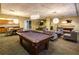 Community game room featuring a pool table, soft seating, and ample lighting at 711 Cosmopolitan Ne Dr # 715, Atlanta, GA 30324