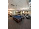 A Game room has a pool table, TVs, and seating is ready for entertainment at 711 Cosmopolitan Ne Dr # 715, Atlanta, GA 30324