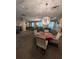 Game room featuring a billiard table, a table with seating, and lounge chairs to relax in at 711 Cosmopolitan Ne Dr # 715, Atlanta, GA 30324