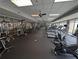 Spacious gym with treadmills, weight machines and glass wall to exercise with natural light at 711 Cosmopolitan Ne Dr # 715, Atlanta, GA 30324
